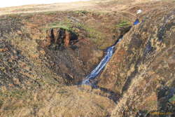 Tiny cliff and tiny waterfall