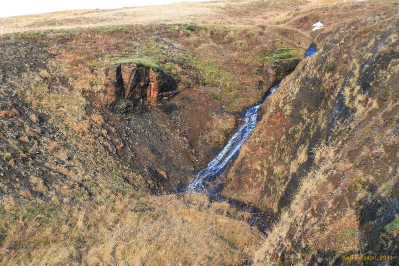 Tiny cliff and tiny waterfall