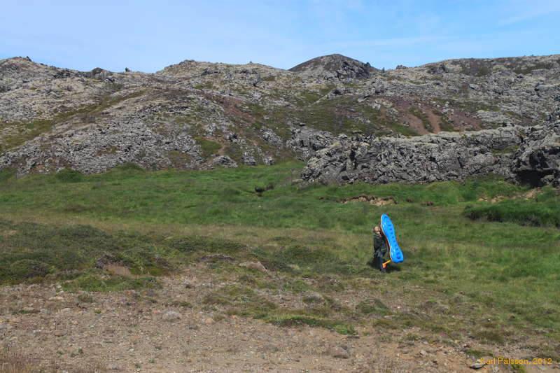 A blow up boat, just what everyone needs in a lava field