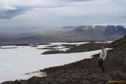 Tryggvi starting back down, Ók and Þórisjökull to the north