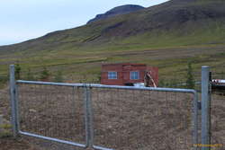 Big gate, little house