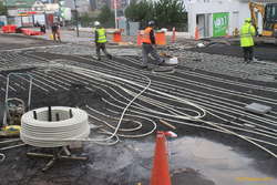 Laying ice melting gear under the street