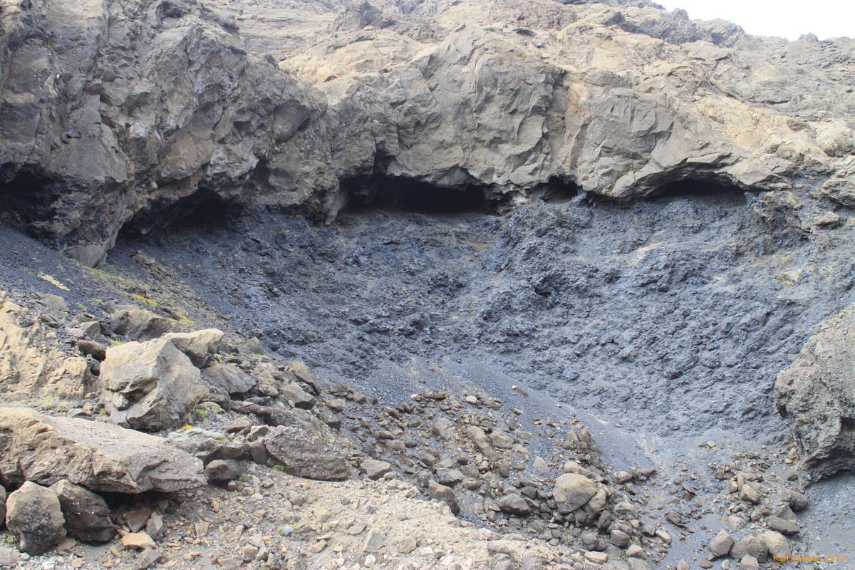 Rotten loose cliff bands block our way