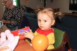 Reading her birthday card