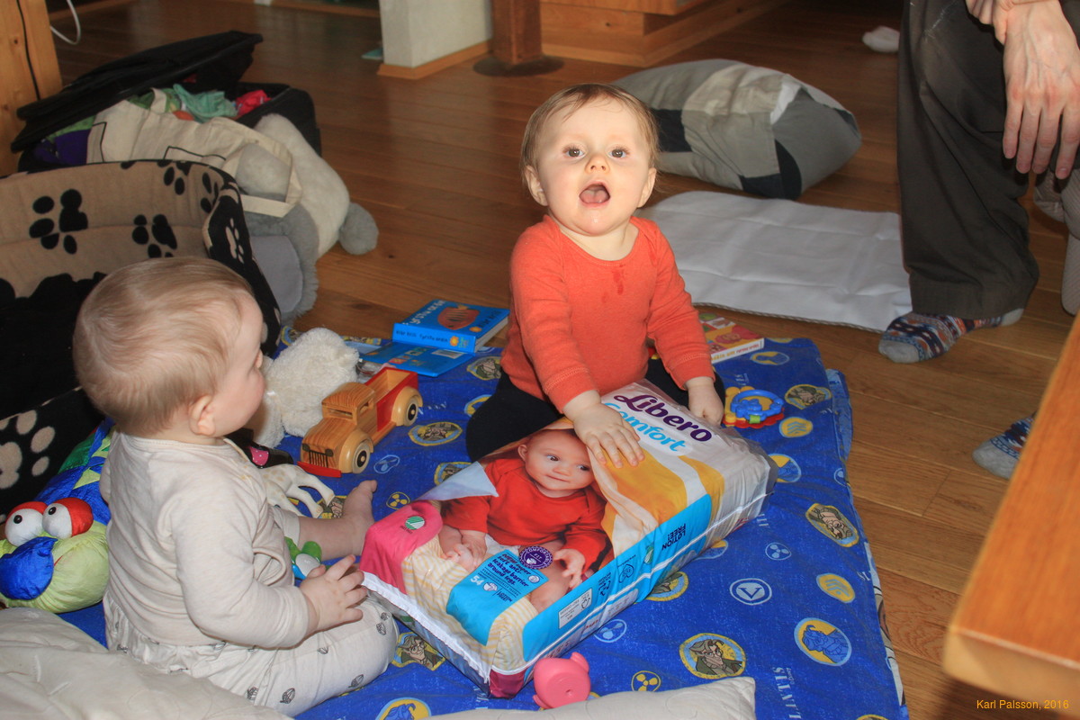 Stella and Vilja playing with a 