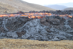 Cooled outflow from earlier